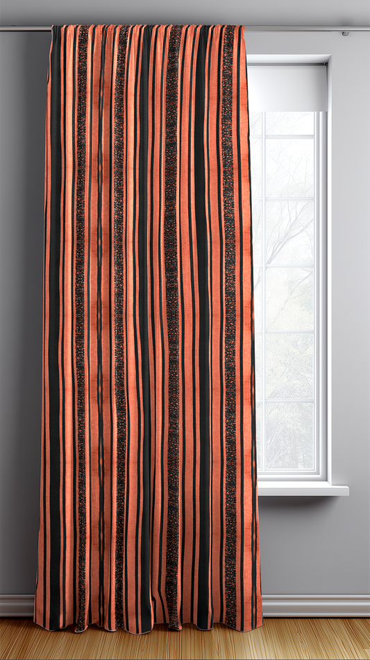 Striped curtain with orange and black pattern in front of a window.
