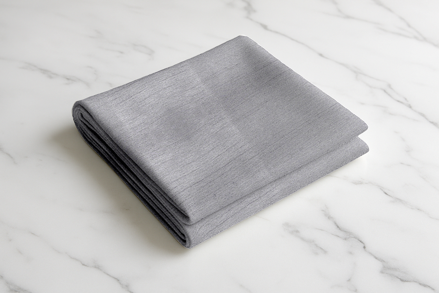 Folded grey textured fabric curtain panel, premium polyester blend, soft sheen finish Grey Haven collection