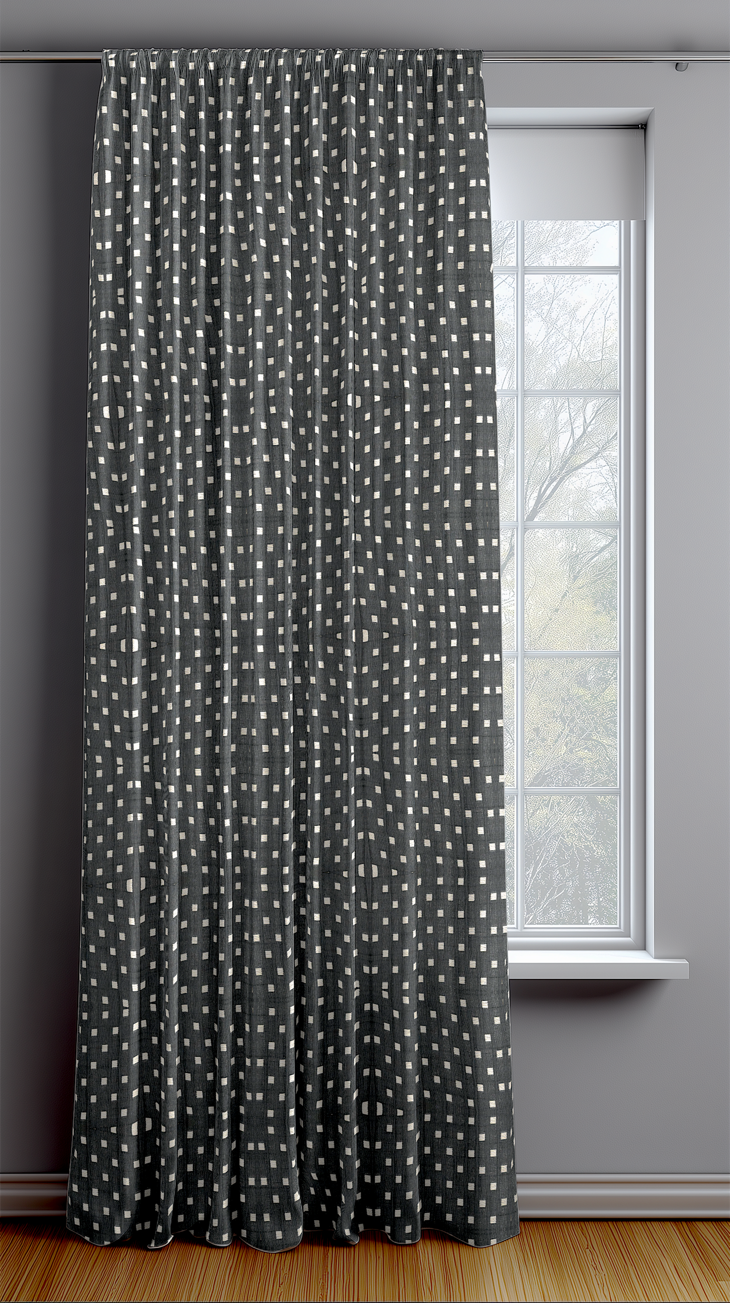 Black ready made curtain with white polka square in a room with a window