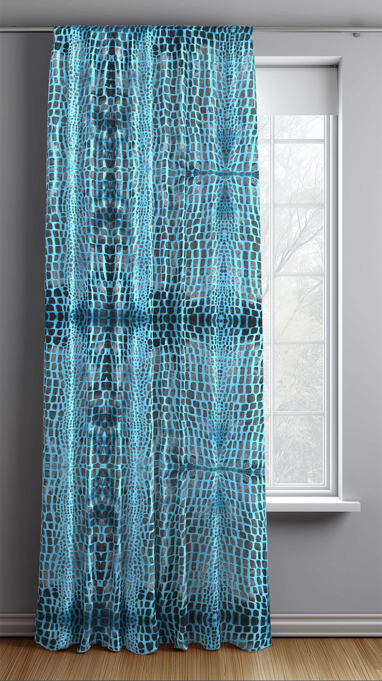 Blue patterned curtain in front of a window with a gray wall background