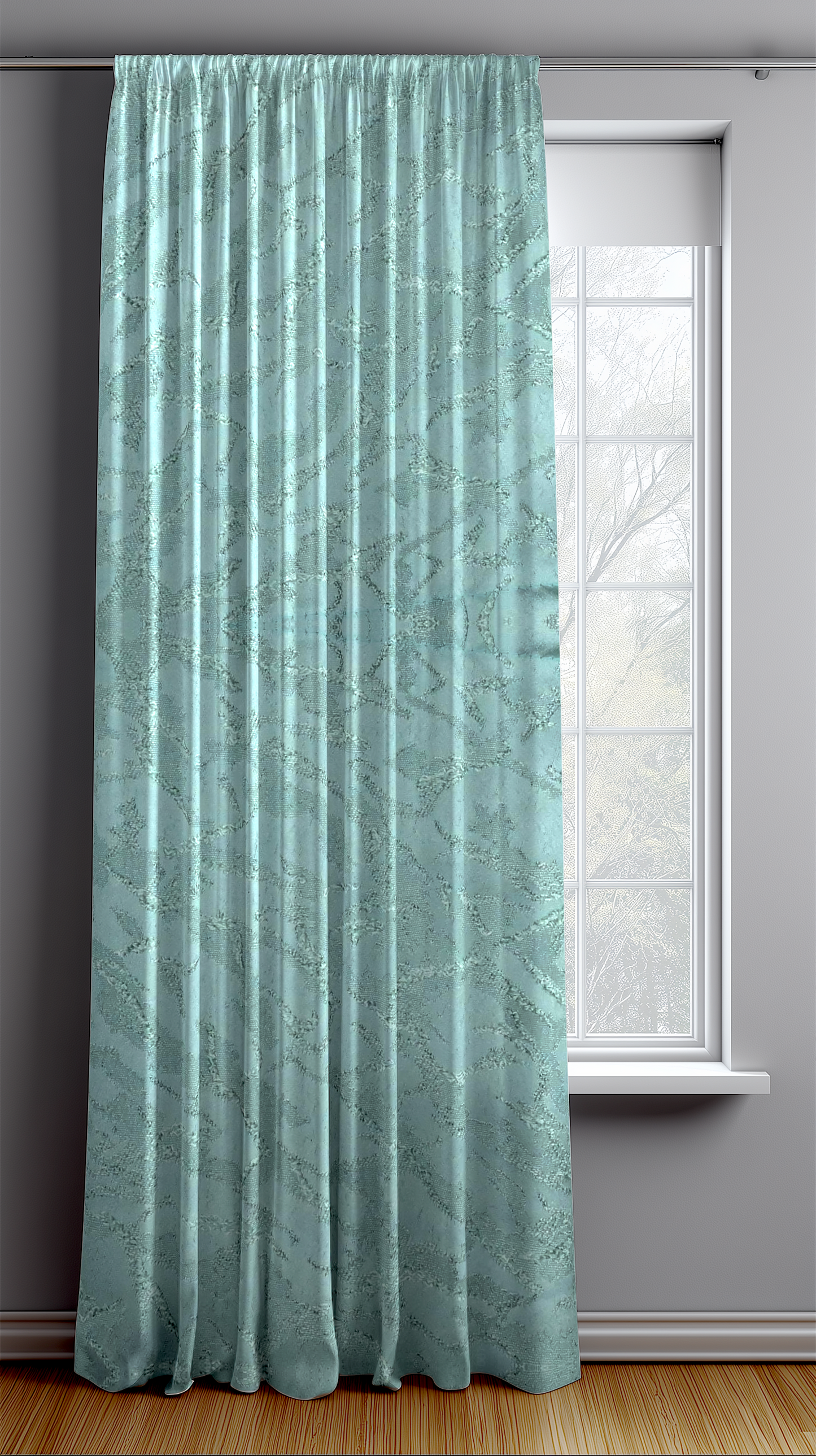 Seafoam vine curtain hanging in front of a window with a white frame on a gray wall.