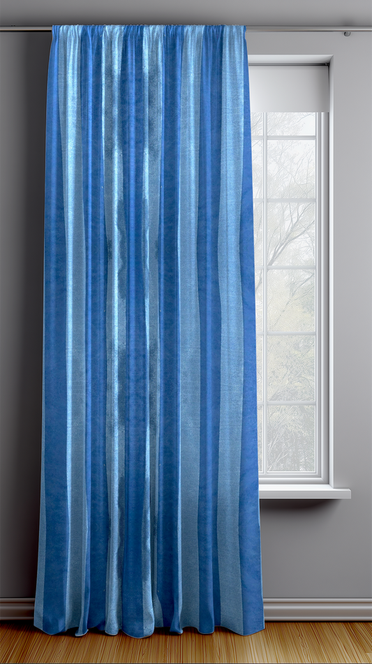 Blue striped curtain in front of a window with a gray wall background
