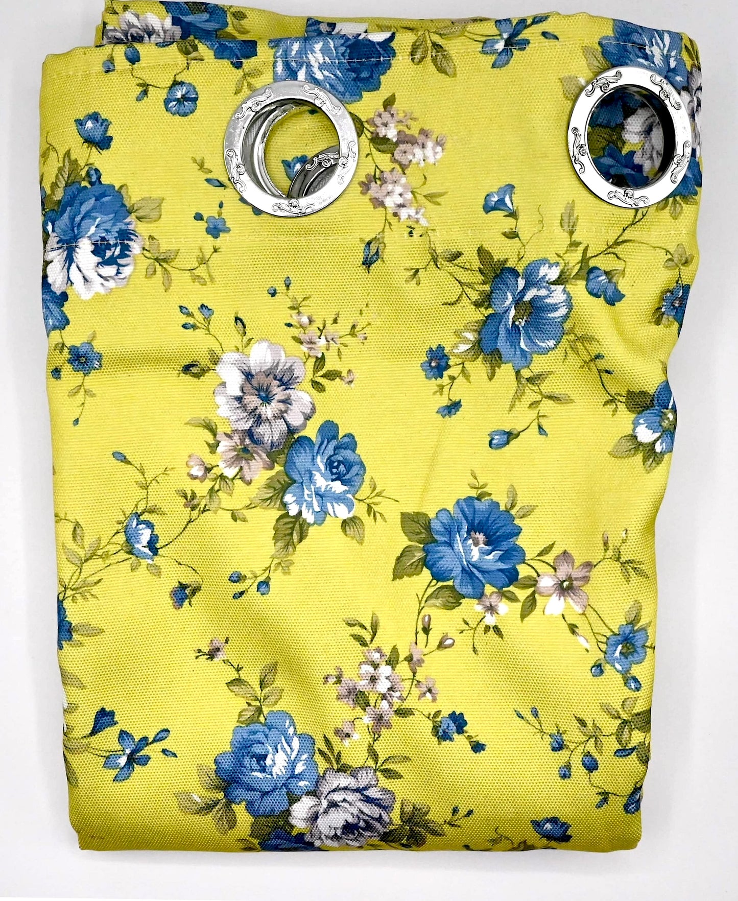Floral-patterned bag with blue flowers on a yellow background
