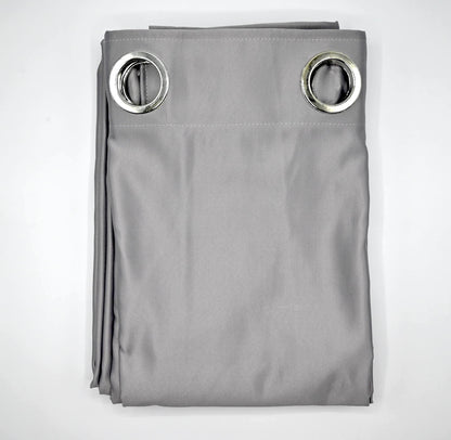 Folded Cool Grey curtain with silver grommets on a plain white background
