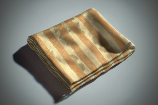 Golden striped curtain fabric with warm metallic sheen and alternating pattern folded on white surface