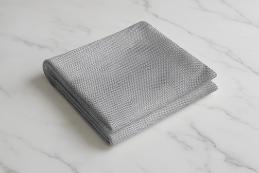 Folded Grey Lattice fabric with a subtle woven texture in light grey