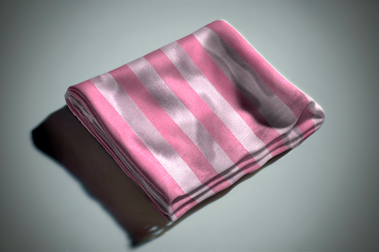 Folded fabric in soft blush pink with alternating satin stripes, ready made curtain