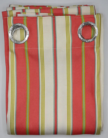 Striped curtain panel with silver rings on a gray background