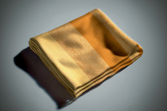 Golden yellow curtain fabric with metallic sheen and textured weave folded on white surface