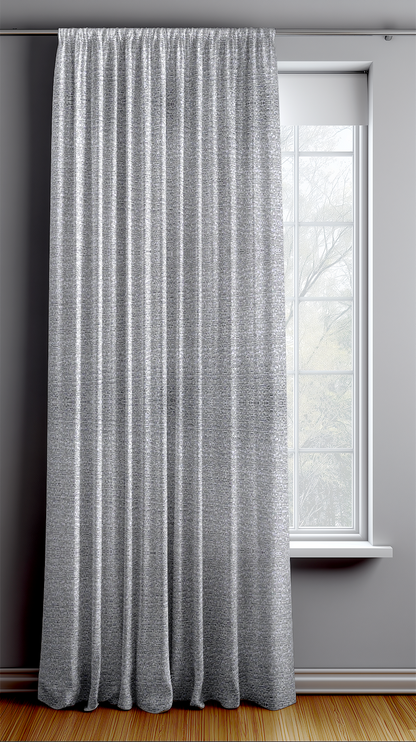 Gray curtain hanging in front of a window with a gray wall background